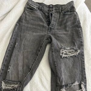 Grey distressed slim straight jeans from urban outfitters.
